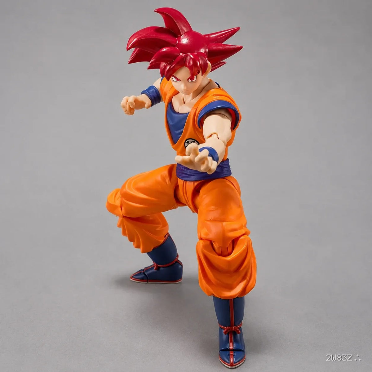 Dragon Ball Super Goku Super Saiyan God Action Figure – 15 cm Articulated Collectible with Interchangeable Faces & Hands