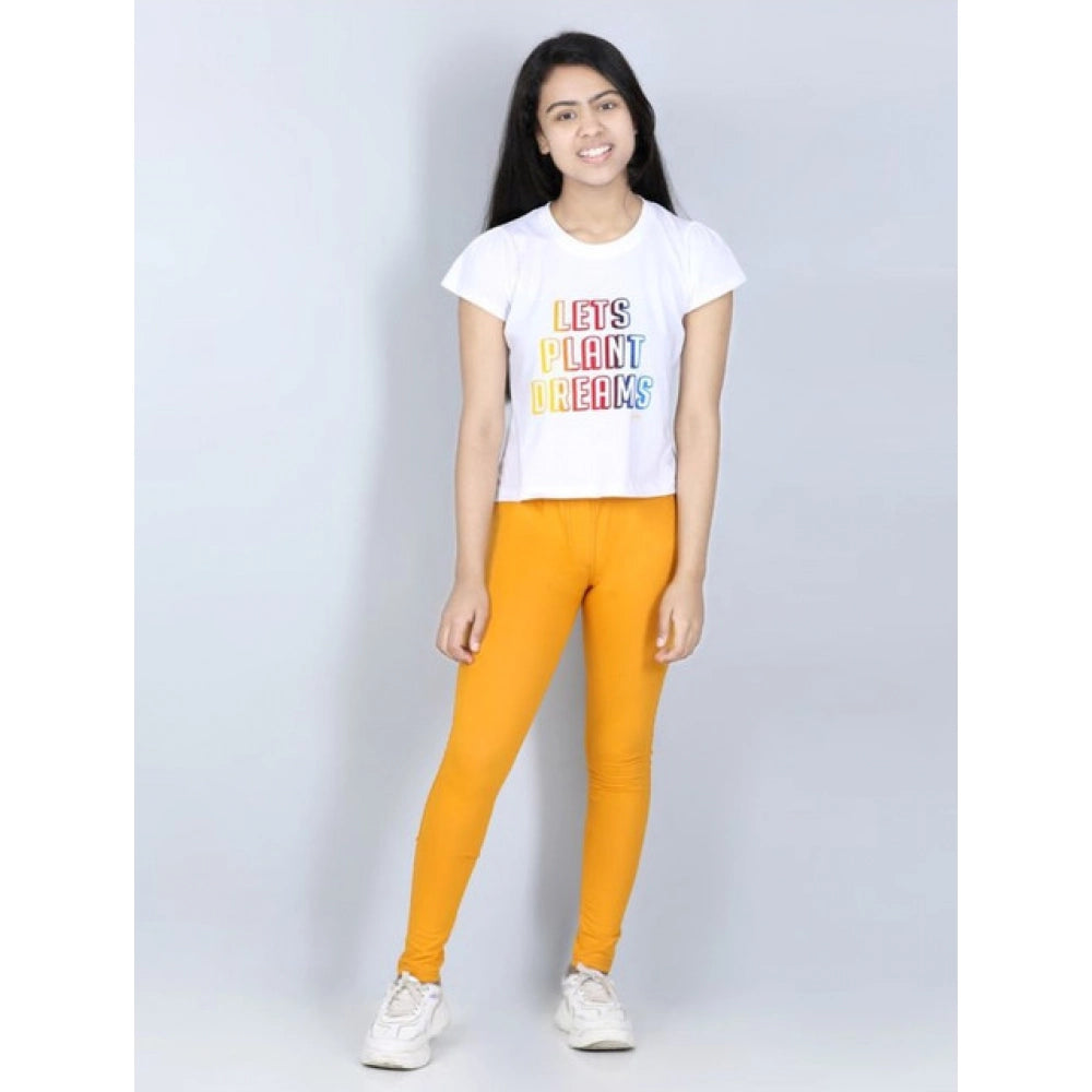 Girl's Cotton Lycra Solid Elasticated Jeggings — Mustard